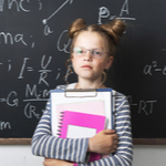 kid holding notebooks